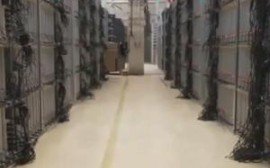 High-tech mining farm filled with rows of cryptocurrency mining machines
